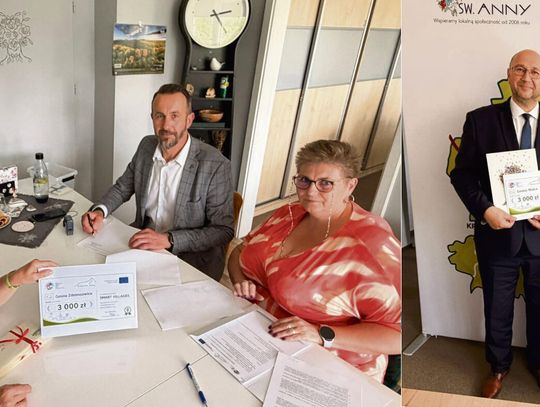 Przedstawiciele samorządów i organizacji pozarządowych podpisujący umowy grantowe na koncepcje smart village w Krainie św. Anny.