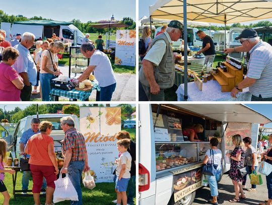 Stoisko z regionalnymi produktami na „Straganiku” w Krapkowicach: świeże warzywa, miody, sery i domowe wyroby od lokalnych producentów.