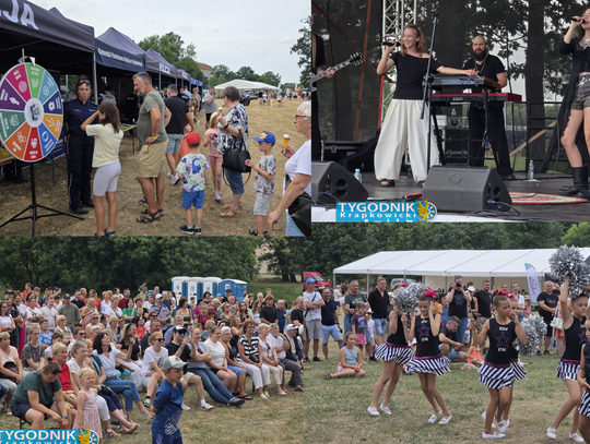 Piknik służb mundurowych przy Marinie w Krapkowicach. Mieszkańcy oglądają policyjny sprzęt, radiowozy i pokazy funkcjonariuszy podczas Święta Policji.
